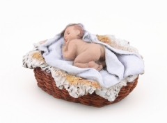 Niño Jesús durmiendo en cesto 17 cm.